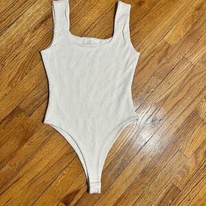 Elegant Cream Women's Bodysuit